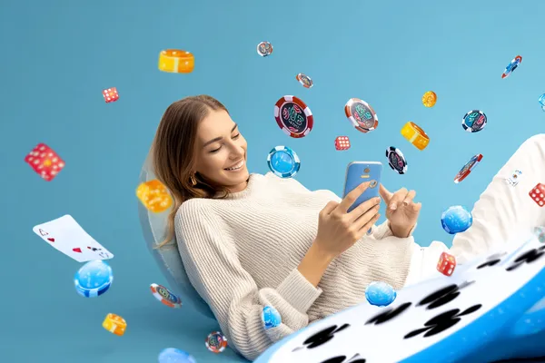 PHILPOWER — A high-class gaming experience without limits A woman in a luxurious green gown next to an ornate roulette wheel, capturing the upscale casino mood of PHILPOWER.